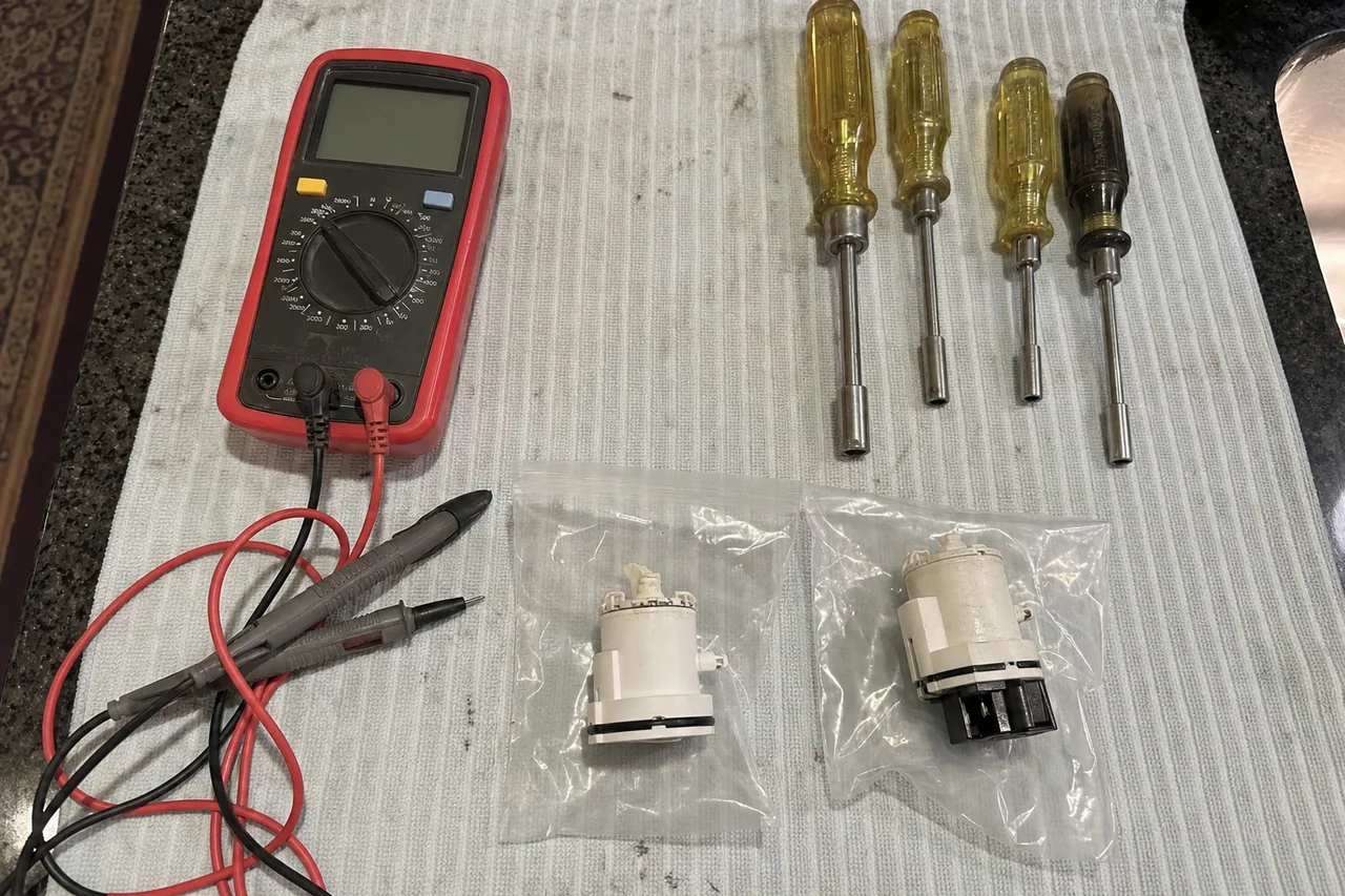 A commercial repair technician's tools laid out